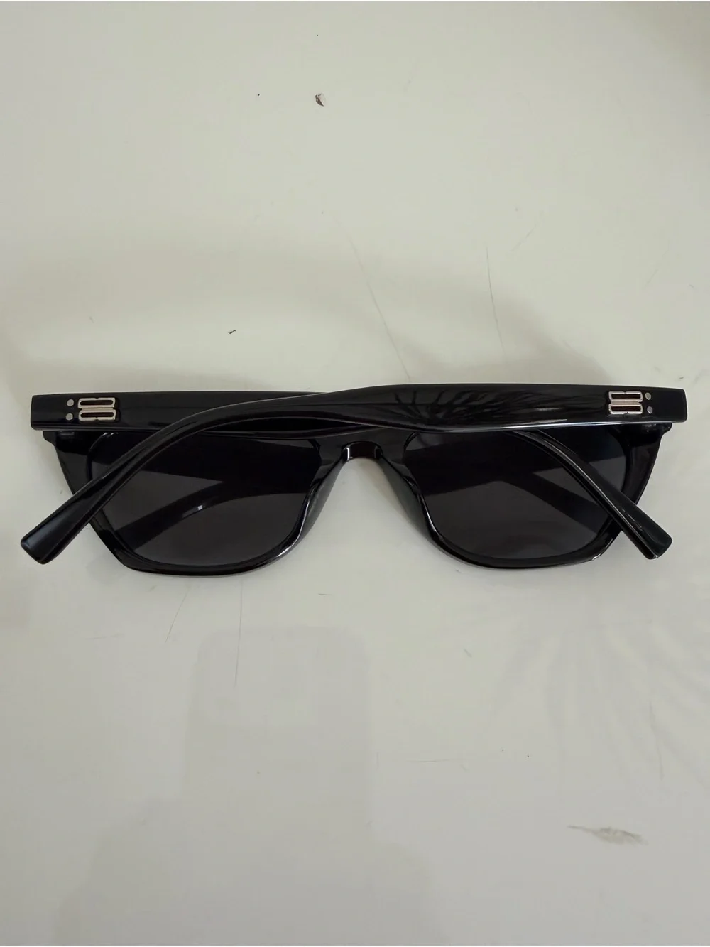 GENTLE MONSTER Black Gloss Cat-Eye Sunglasses with Dark Lenses